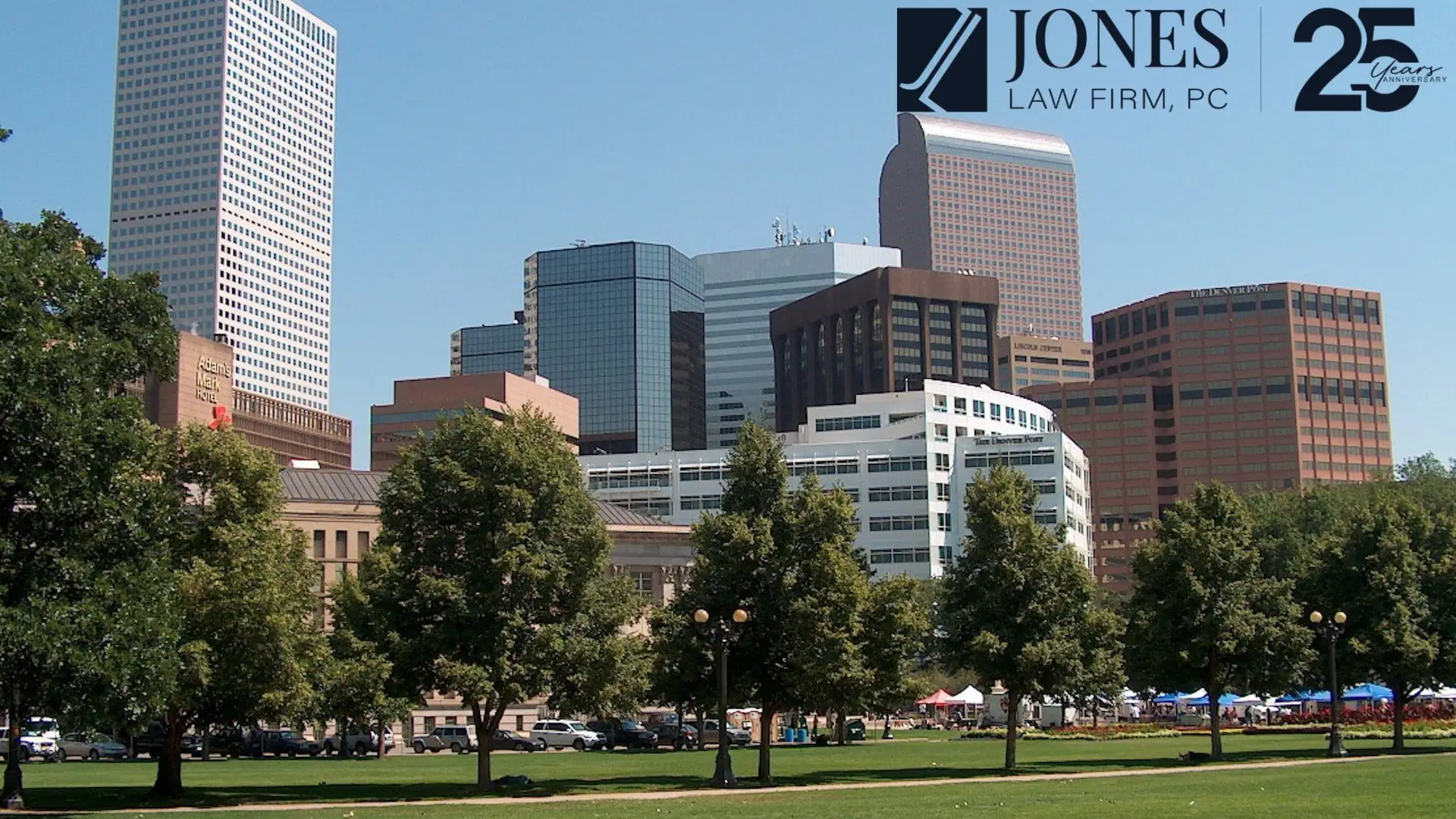 Denver skyline with park and office buildings