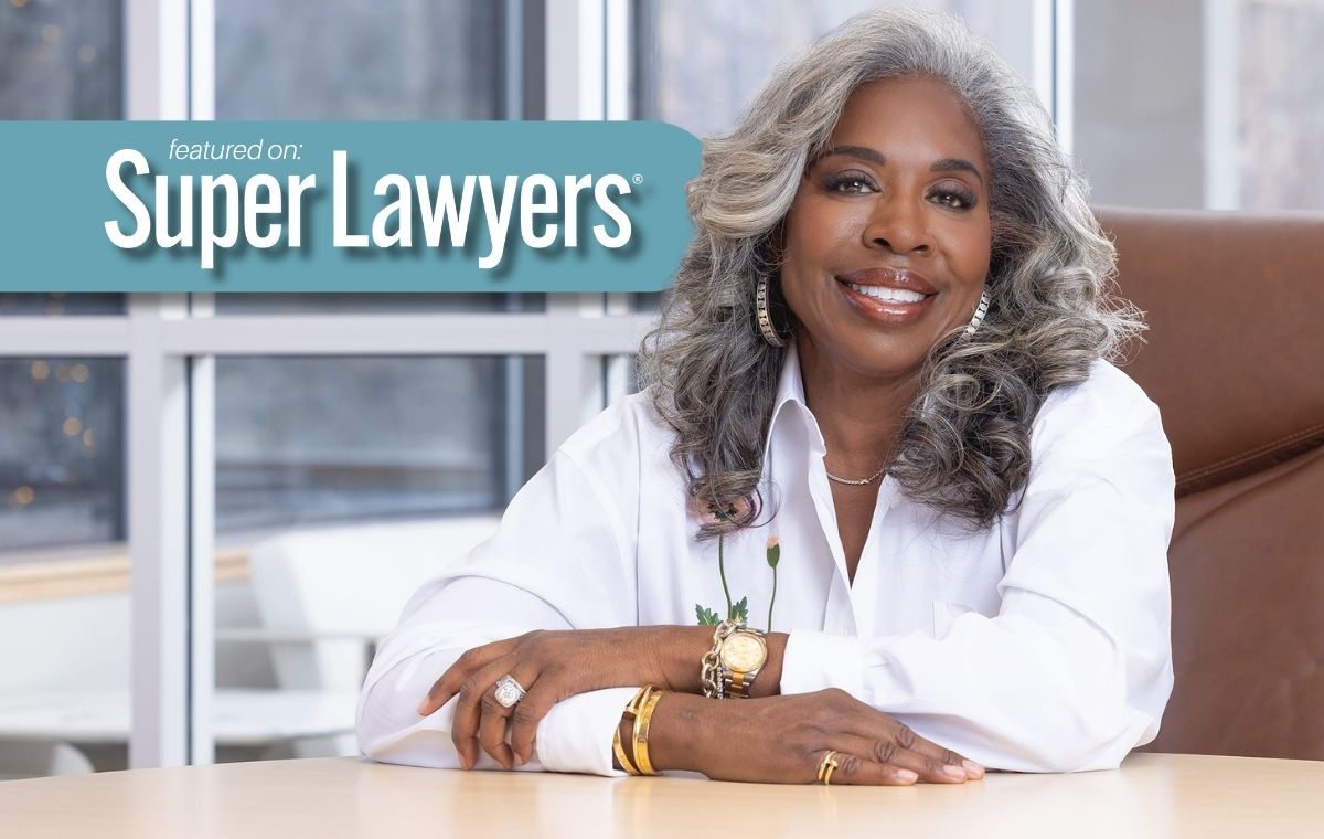 Smiling attorney featured on Super Lawyers promotional graphic